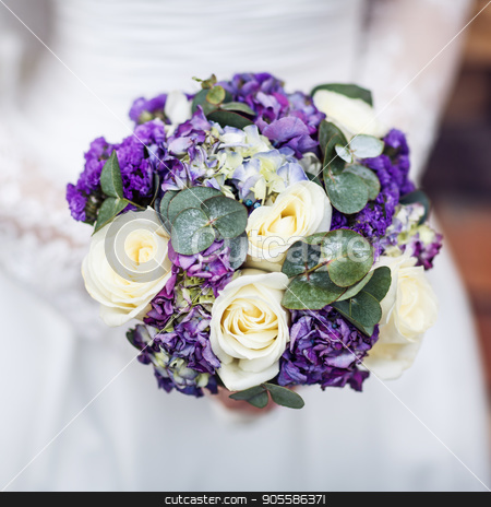 To use this stock image in your creative project, please select the size you need over to the right and click the "Add to Cart" button.
Your downloaded image will come with the Cutcaster watermark removed so don’t worry about the watermark you see on this page. Purple wedding bouquet. stock photo, Beautiful purple wedding bouquet in hands. The bride's bouquet. by Dmitrii Kotin