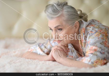 To use this stock image in your creative project, please select the size you need over to the right and click the "Add to Cart" button.
Your downloaded image will come with the Cutcaster watermark removed so don’t worry about the watermark you see on this page. Beautiful sad elderly woman close-up stock photo, Portrait of a beautiful sad elderly woman close-up by Ruslan Huzau