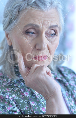 To use this stock image in your creative project, please select the size you need over to the right and click the "Add to Cart" button.
Your downloaded image will come with the Cutcaster watermark removed so don’t worry about the watermark you see on this page. Beautiful sad elderly woman close-up stock photo, Portrait of a beautiful sad elderly woman close-up by Ruslan Huzau