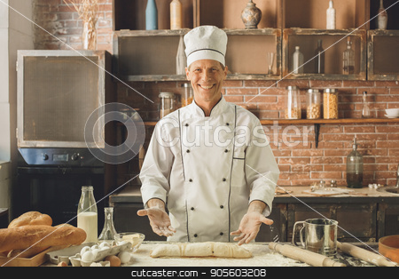 To use this stock image in your creative project, please select the size you need over to the right and click the "Add to Cart" button.
Your downloaded image will come with the Cutcaster watermark removed so don’t worry about the watermark you see on this page. Bakery chef cooking bake in the kitchen professional stock photo, Bakery chef cooking bake in the kitchen professional making roll by Dmytro Sidelnikov