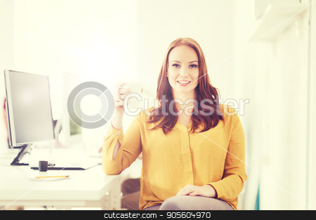 To use this stock image in your creative project, please select the size you need over to the right and click the "Add to Cart" button.
Your downloaded image will come with the Cutcaster watermark removed so don’t worry about the watermark you see on this page. happy woman drinking coffee or tea at office stock photo, business, startup, people and break concept - happy businesswoman drinking coffee or tea at office by Syda Productions