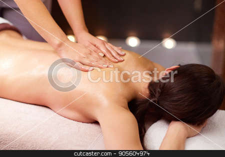 To use this stock image in your creative project, please select the size you need over to the right and click the "Add to Cart" button.
Your downloaded image will come with the Cutcaster watermark removed so don’t worry about the watermark you see on this page. woman having back massage with gel at spa stock photo, people, beauty, healthy lifestyle and relaxation concept - beautiful young woman lying and having back massage with gel at spa by Syda Productions