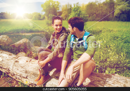 To use this stock image in your creative project, please select the size you need over to the right and click the "Add to Cart" button.
Your downloaded image will come with the Cutcaster watermark removed so don’t worry about the watermark you see on this page. smiling couple with backpacks in nature stock photo, travel, hiking, backpacking, tourism and people concept - smiling couple with backpacks resting and talking in nature by Syda Productions