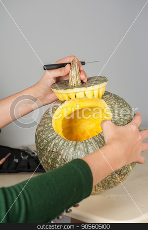 To use this stock image in your creative project, please select the size you need over to the right and click the "Add to Cart" button.
Your downloaded image will come with the Cutcaster watermark removed so don’t worry about the watermark you see on this page. Preparing for halloween stock photo, woman hands making pumpkin for halloween holidays by olinchuk