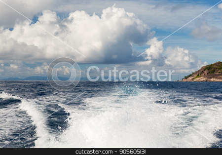 To use this stock image in your creative project, please select the size you need over to the right and click the "Add to Cart" button.
Your downloaded image will come with the Cutcaster watermark removed so don’t worry about the watermark you see on this page. indian ocean and leaving boat trace on water stock photo, travel, seascape and nature concept - sea or indian ocean and trace on water of boat leaving seychelles by Syda Productions