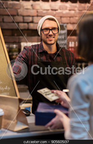 To use this stock image in your creative project, please select the size you need over to the right and click the "Add to Cart" button.
Your downloaded image will come with the Cutcaster watermark removed so don’t worry about the watermark you see on this page. happy barman and woman paying money at cafe stock photo, small business, payment, people and service concept - happy barman and woman paying money at cafe by Syda Productions