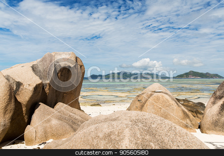 To use this stock image in your creative project, please select the size you need over to the right and click the "Add to Cart" button.
Your downloaded image will come with the Cutcaster watermark removed so don’t worry about the watermark you see on this page. rocks on seychelles island beach in indian ocean stock photo, travel, landscape and nature concept - rocks on seychelles island beach in indian ocean by Syda Productions