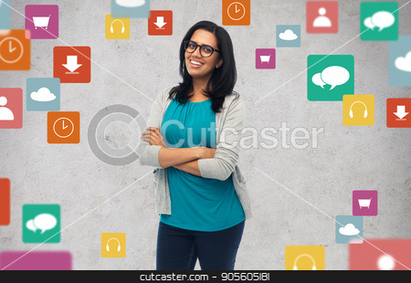 To use this stock image in your creative project, please select the size you need over to the right and click the "Add to Cart" button.
Your downloaded image will come with the Cutcaster watermark removed so don’t worry about the watermark you see on this page. happy smiling young indian woman in glasses stock photo, people, multimedia and technology concept - happy smiling young indian woman in glasses by Syda Productions