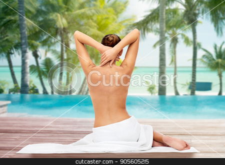 To use this stock image in your creative project, please select the size you need over to the right and click the "Add to Cart" button.
Your downloaded image will come with the Cutcaster watermark removed so don’t worry about the watermark you see on this page. beautiful woman in towel with bare top on beach stock photo, beauty, people and bodycare concept - beautiful young woman in white towel with bare top over beach and outdoor swimming pool background by Syda Productions