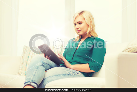 To use this stock image in your creative project, please select the size you need over to the right and click the "Add to Cart" button.
Your downloaded image will come with the Cutcaster watermark removed so don’t worry about the watermark you see on this page. smiling woman with tablet pc at home stock photo, technology, internet and people concept concept - smiling woman sitting on couch with tablet pc computer at home by Syda Productions