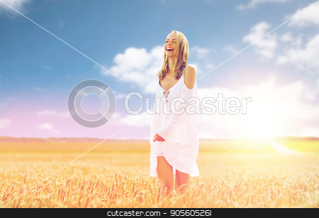 To use this stock image in your creative project, please select the size you need over to the right and click the "Add to Cart" button.
Your downloaded image will come with the Cutcaster watermark removed so don’t worry about the watermark you see on this page. smiling young woman in white dress on cereal field stock photo, country, nature, summer holidays, vacation and people concept - smiling young woman in white dress on cereal field by Syda Productions