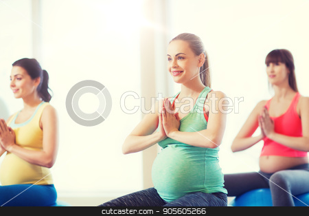 To use this stock image in your creative project, please select the size you need over to the right and click the "Add to Cart" button.
Your downloaded image will come with the Cutcaster watermark removed so don’t worry about the watermark you see on this page. happy pregnant women exercising on fitball in gym stock photo, pregnancy, sport, fitness, people and healthy lifestyle concept - group of happy pregnant women exercising on ball in gym by Syda Productions