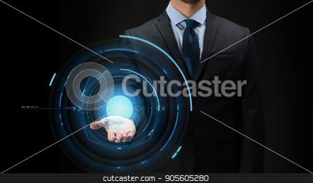 To use this stock image in your creative project, please select the size you need over to the right and click the "Add to Cart" button.
Your downloaded image will come with the Cutcaster watermark removed so don’t worry about the watermark you see on this page. businessman with virtual projection over black stock photo, business, future technology, cyberspace and people - close up of businessman with virtual projection over black background by Syda Productions