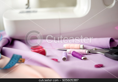 To use this stock image in your creative project, please select the size you need over to the right and click the "Add to Cart" button.
Your downloaded image will come with the Cutcaster watermark removed so don’t worry about the watermark you see on this page. sewing machine, scissors, buttons and fabric stock photo, needlework, technology and tailoring concept - sewing machine with scissors, spools of thread, buttons and fabric by Syda Productions