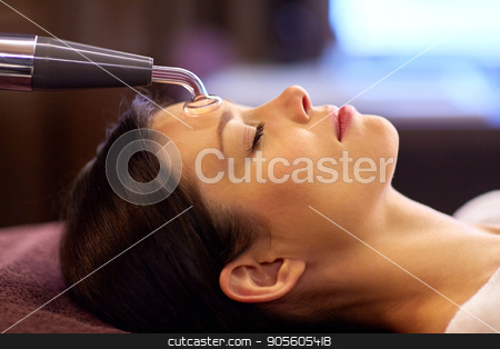 To use this stock image in your creative project, please select the size you need over to the right and click the "Add to Cart" button.
Your downloaded image will come with the Cutcaster watermark removed so don’t worry about the watermark you see on this page. woman having hydradermie facial treatment in spa stock photo, people, beauty, cosmetology and technology concept - beautiful young woman having needle free mesotherapy or hydradermie facial treatment by microcurrent firming device in spa by Syda Productions