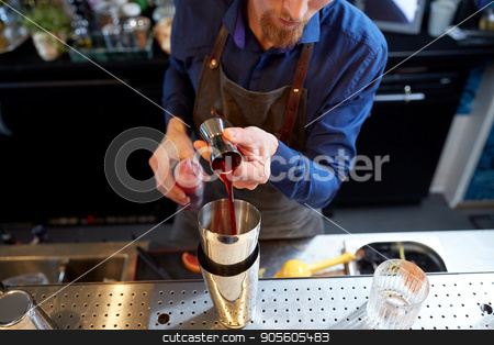 To use this stock image in your creative project, please select the size you need over to the right and click the "Add to Cart" button.
Your downloaded image will come with the Cutcaster watermark removed so don’t worry about the watermark you see on this page. bartender with shaker preparing cocktail at bar stock photo, drinks, people and luxury concept - bartender pouring alcohol from jigger into shaker and preparing cocktail at bar by Syda Productions