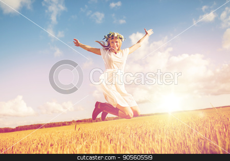 To use this stock image in your creative project, please select the size you need over to the right and click the "Add to Cart" button.
Your downloaded image will come with the Cutcaster watermark removed so don’t worry about the watermark you see on this page. happy woman in wreath jumping on cereal field stock photo, happiness, nature, summer holidays, vacation and people concept - smiling young woman in wreath of flowers and gumboots jumping on cereal field by Syda Productions