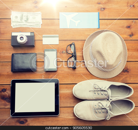 To use this stock image in your creative project, please select the size you need over to the right and click the "Add to Cart" button.
Your downloaded image will come with the Cutcaster watermark removed so don’t worry about the watermark you see on this page. close up of gadgets and traveler personal stuff stock photo, vacation, travel, tourism, technology and objects concept - close up of gadgets and traveler personal stuff by Syda Productions