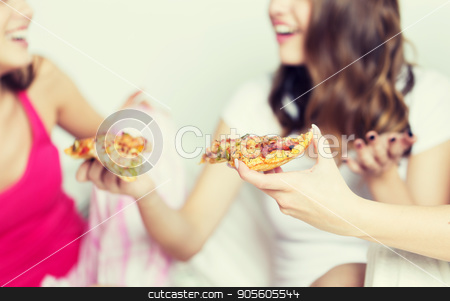 To use this stock image in your creative project, please select the size you need over to the right and click the "Add to Cart" button.
Your downloaded image will come with the Cutcaster watermark removed so don’t worry about the watermark you see on this page. happy friends or teen girls eating pizza at home stock photo, friendship, people, pajama party and junk food concept - close up of happy friends or teenage girls eating pizza at home by Syda Productions