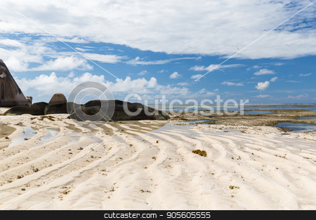 To use this stock image in your creative project, please select the size you need over to the right and click the "Add to Cart" button.
Your downloaded image will come with the Cutcaster watermark removed so don’t worry about the watermark you see on this page. rocks on seychelles island beach in indian ocean stock photo, travel, landscape and nature concept - rocks on seychelles island beach in indian ocean by Syda Productions