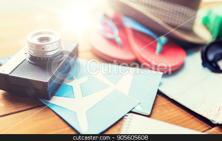 To use this stock image in your creative project, please select the size you need over to the right and click the "Add to Cart" button.
Your downloaded image will come with the Cutcaster watermark removed so don’t worry about the watermark you see on this page. close up of camera, tickets and travel stuff stock photo, summer vacation, travel, tourism and objects concept - close up of camera, airplane tickets and personal accessories by Syda Productions
