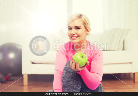 To use this stock image in your creative project, please select the size you need over to the right and click the "Add to Cart" button.
Your downloaded image will come with the Cutcaster watermark removed so don’t worry about the watermark you see on this page. happy woman eating green apple at home stock photo, healthy eating, organic food, diet and people concept - happy woman eating green apple at home by Syda Productions