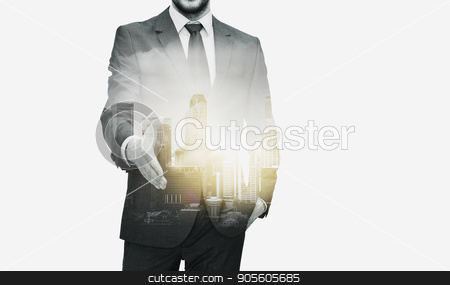 To use this stock image in your creative project, please select the size you need over to the right and click the "Add to Cart" button.
Your downloaded image will come with the Cutcaster watermark removed so don’t worry about the watermark you see on this page. businessman with open hand ready for handshake stock photo, business, gesture, partnership, cooperation and people concept - businessman with open hand ready for handshake over city buildings and double exposure effect by Syda Productions
