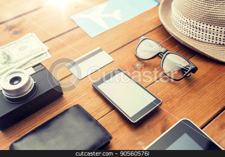 To use this stock image in your creative project, please select the size you need over to the right and click the "Add to Cart" button.
Your downloaded image will come with the Cutcaster watermark removed so don’t worry about the watermark you see on this page. close up of gadgets and traveler personal stuff stock photo, vacation, travel, tourism, technology and objects concept - close up of gadgets and traveler personal stuff by Syda Productions