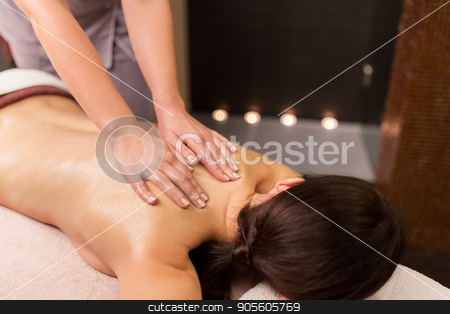 To use this stock image in your creative project, please select the size you need over to the right and click the "Add to Cart" button.
Your downloaded image will come with the Cutcaster watermark removed so don’t worry about the watermark you see on this page. woman lying and having back massage at spa parlor stock photo, people, beauty, healthy lifestyle and relaxation concept - beautiful young woman lying and having back massage at spa parlor by Syda Productions