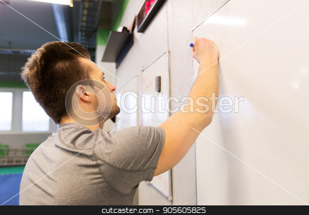 To use this stock image in your creative project, please select the size you need over to the right and click the "Add to Cart" button.
Your downloaded image will come with the Cutcaster watermark removed so don’t worry about the watermark you see on this page. man writing note to whiteboard in gym stock photo, sport, fitness and people concept - man writing note to whiteboard in gym by Syda Productions