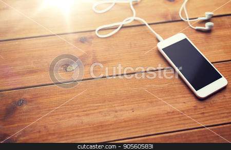 To use this stock image in your creative project, please select the size you need over to the right and click the "Add to Cart" button.
Your downloaded image will come with the Cutcaster watermark removed so don’t worry about the watermark you see on this page. close up of blank smartphone and earphones on wood stock photo, technology, music, gadget and object concept - close up of white smartphone and earphones on wooden surface with copy space by Syda Productions