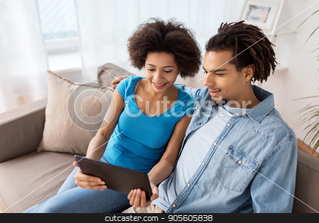 To use this stock image in your creative project, please select the size you need over to the right and click the "Add to Cart" button.
Your downloaded image will come with the Cutcaster watermark removed so don’t worry about the watermark you see on this page. smiling happy couple with tablet pc at home stock photo, family, technology, internet and people concept - smiling happy couple with tablet pc computer at home by Syda Productions