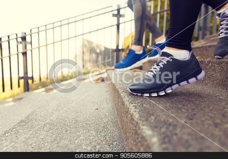 To use this stock image in your creative project, please select the size you need over to the right and click the "Add to Cart" button.
Your downloaded image will come with the Cutcaster watermark removed so don’t worry about the watermark you see on this page. close up of feet running downstairs in city stock photo, fitness, sport, people and lifestyle concept - close up of feet in shoes running downstairs in city by Syda Productions