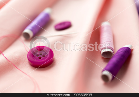 To use this stock image in your creative project, please select the size you need over to the right and click the "Add to Cart" button.
Your downloaded image will come with the Cutcaster watermark removed so don’t worry about the watermark you see on this page. sewing buttons, spools of thread and cloth stock photo, needlework and tailoring concept - sewing buttons, spools of thread and cloth by Syda Productions