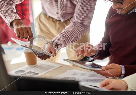 To use this stock image in your creative project, please select the size you need over to the right and click the "Add to Cart" button.
Your downloaded image will come with the Cutcaster watermark removed so don’t worry about the watermark you see on this page. businessmen with tablet pc and charts at office stock photo, business, technology and people concept - businessmen with tablet pc computer and charts at office by Syda Productions