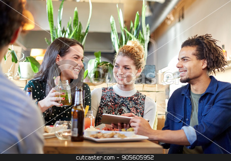 To use this stock image in your creative project, please select the size you need over to the right and click the "Add to Cart" button.
Your downloaded image will come with the Cutcaster watermark removed so don’t worry about the watermark you see on this page. friends with tablet pc, drinks and food at bar stock photo, technology, people and friendship concept - happy friends with tablet pc computer, drinks and food at bar by Syda Productions