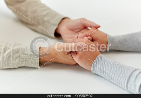 To use this stock image in your creative project, please select the size you need over to the right and click the "Add to Cart" button.
Your downloaded image will come with the Cutcaster watermark removed so don’t worry about the watermark you see on this page. close up of old man and young woman holding hands stock photo, old age, support, charity, care and people concept - close up of senior man and young woman holding hands by Syda Productions