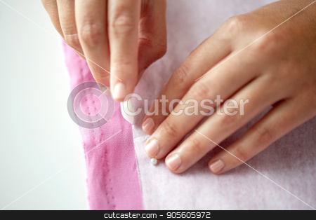 To use this stock image in your creative project, please select the size you need over to the right and click the "Add to Cart" button.
Your downloaded image will come with the Cutcaster watermark removed so don’t worry about the watermark you see on this page. woman with pattern and chalk drawing on fabric stock photo, people, stitching, needlework and tailoring concept - tailor woman with paper pattern and chalk drawing on fabric at sewing studio by Syda Productions