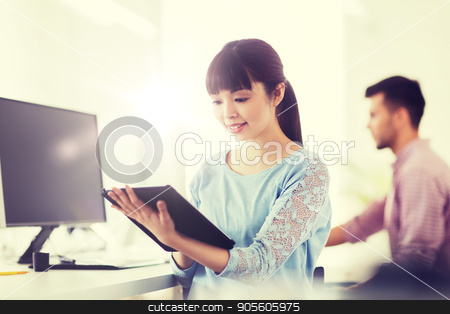 To use this stock image in your creative project, please select the size you need over to the right and click the "Add to Cart" button.
Your downloaded image will come with the Cutcaster watermark removed so don’t worry about the watermark you see on this page. happy creative female office worker with tablet pc stock photo, business, startup and people concept - happy asian businesswoman or creative female office worker with tablet pc computer by Syda Productions