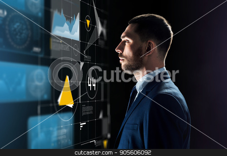 To use this stock image in your creative project, please select the size you need over to the right and click the "Add to Cart" button.
Your downloaded image will come with the Cutcaster watermark removed so don’t worry about the watermark you see on this page. businessman in suit looking at virtual projection stock photo, business, people and technology concept - businessman in suit looking at virtual projection over black background by Syda Productions