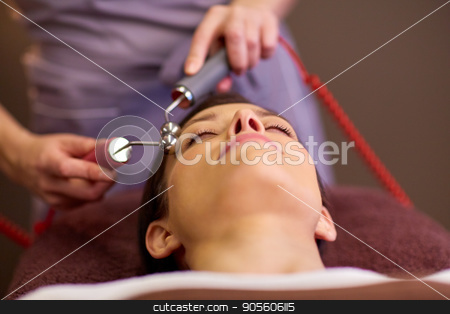 To use this stock image in your creative project, please select the size you need over to the right and click the "Add to Cart" button.
Your downloaded image will come with the Cutcaster watermark removed so don’t worry about the watermark you see on this page. woman having hydradermie facial treatment in spa stock photo, people, beauty, cosmetology and technology concept - beautiful young woman having needle free mesotherapy or hydradermie facial treatment by microcurrent firming device in spa by Syda Productions