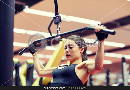 To use this stock image in your creative project, please select the size you need over to the right and click the "Add to Cart" button.
Your downloaded image will come with the Cutcaster watermark removed so don’t worry about the watermark you see on this page. woman flexing arm muscles on cable machine in gym stock photo, sport, fitness, bodybuilding, lifestyle and people concept - woman flexing arm muscles on cable machine in gym by Syda Productions