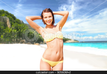 To use this stock image in your creative project, please select the size you need over to the right and click the "Add to Cart" button.
Your downloaded image will come with the Cutcaster watermark removed so don’t worry about the watermark you see on this page. happy woman in bikini swimsuit on tropical beach stock photo, people, summer holidays, vacation and travel concept - happy smiling young woman posing in bikini swimsuit posing with raised hands over exotic tropical beach and sea shore background by Syda Productions