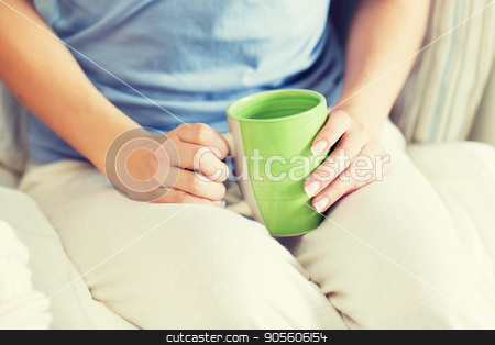 To use this stock image in your creative project, please select the size you need over to the right and click the "Add to Cart" button.
Your downloaded image will come with the Cutcaster watermark removed so don’t worry about the watermark you see on this page. close up of young woman with tea cup stock photo, people and drinks concept - close up of young woman with tea cup by Syda Productions