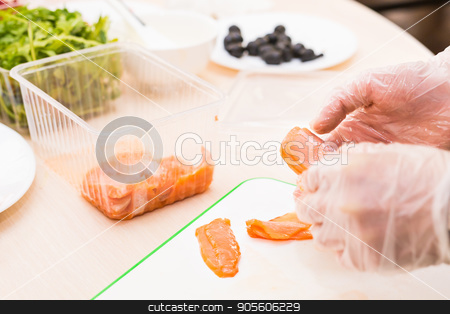 To use this stock image in your creative project, please select the size you need over to the right and click the "Add to Cart" button.
Your downloaded image will come with the Cutcaster watermark removed so don’t worry about the watermark you see on this page. chef cooking food kitchen restaurant cutting cook hands hotel man male knife preparation fresh preparing concept stock photo, chef cooking food kitchen restaurant cutting cook hands hotel man male knife preparation fresh preparing concept by Satura86