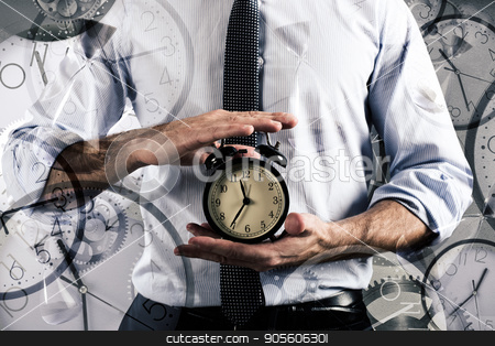 To use this stock image in your creative project, please select the size you need over to the right and click the "Add to Cart" button.
Your downloaded image will come with the Cutcaster watermark removed so don’t worry about the watermark you see on this page. Concept of delay and time with clock stock photo, Businessman holds an alarm clock. Concept of delay and time by Federico Caputo