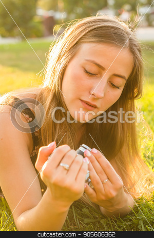 To use this stock image in your creative project, please select the size you need over to the right and click the "Add to Cart" button.
Your downloaded image will come with the Cutcaster watermark removed so don’t worry about the watermark you see on this page. woman the photographer with old camera lays on a grass stock photo, woman the photographer with old camera lays on a grass by Satura86
