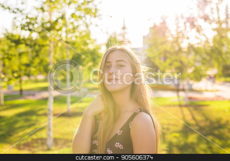 To use this stock image in your creative project, please select the size you need over to the right and click the "Add to Cart" button.
Your downloaded image will come with the Cutcaster watermark removed so don’t worry about the watermark you see on this page. Summer girl portrait. Happy woman smiling on sunny summer or spring day outside in park. Pretty Caucasian woman outdoors stock photo, Summer girl portrait. Happy woman smiling on sunny summer or spring day outside in park. Pretty Caucasian woman outdoors by Satura86