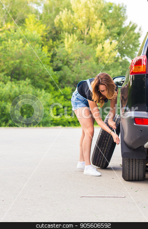 To use this stock image in your creative project, please select the size you need over to the right and click the "Add to Cart" button.
Your downloaded image will come with the Cutcaster watermark removed so don’t worry about the watermark you see on this page. Woman changes the wheel of car on a road stock photo, Woman changes the wheel of car on a road by Satura86