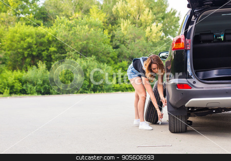 To use this stock image in your creative project, please select the size you need over to the right and click the "Add to Cart" button.
Your downloaded image will come with the Cutcaster watermark removed so don’t worry about the watermark you see on this page. Woman changes the wheel of car on a road stock photo, Woman changes the wheel of car on a road by Satura86
